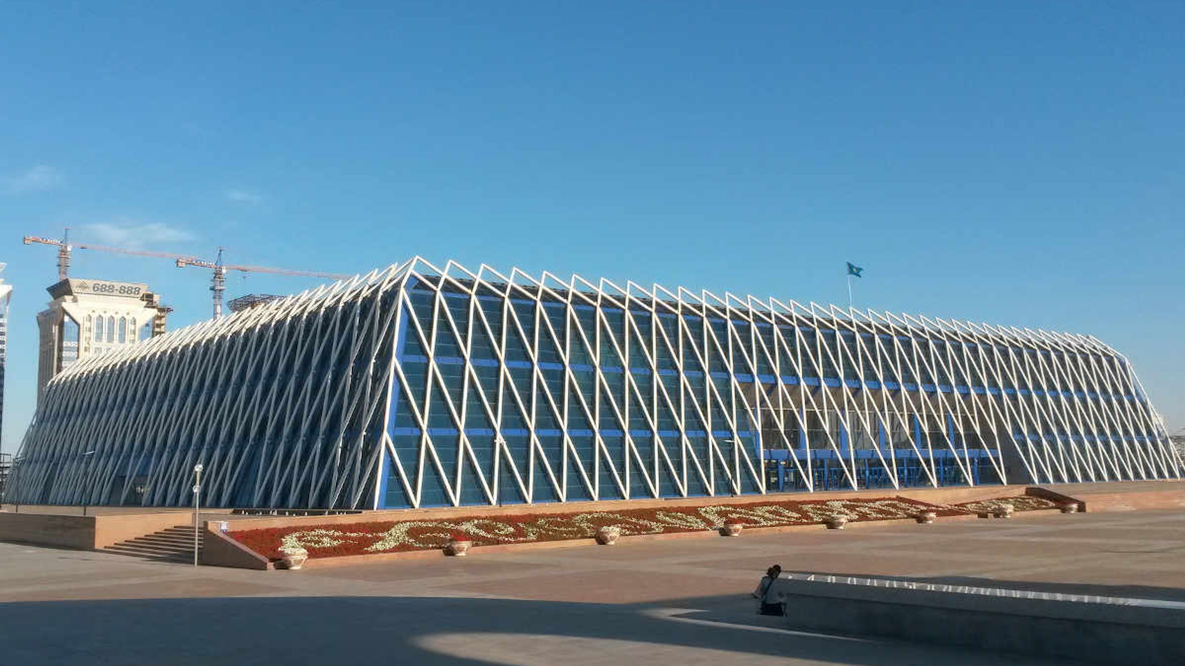 Palace of Independence in Astana, Kazakhstan β modern architecture and popular tourist attraction under a clear blue sky.