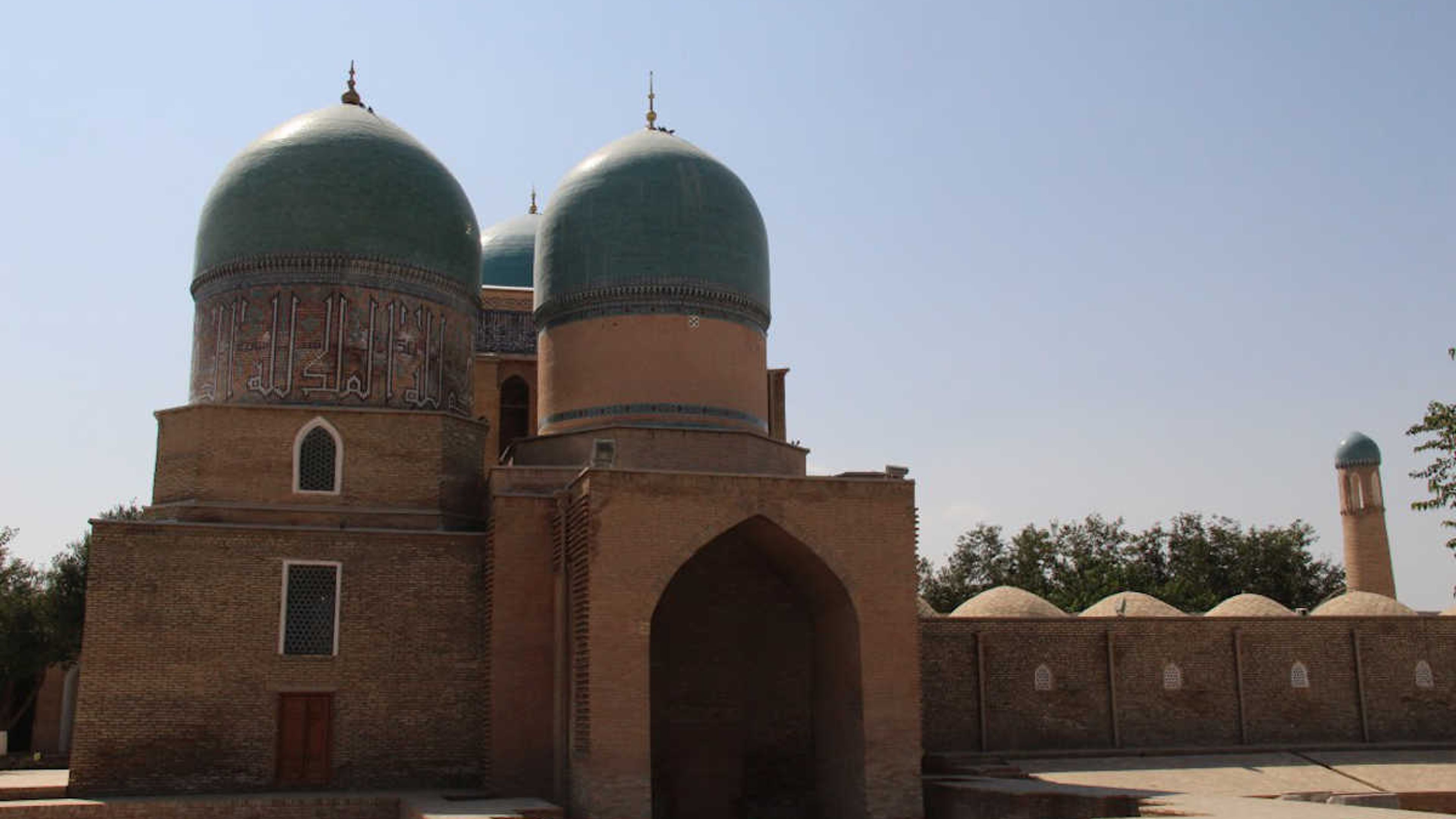 Gumbazi Sayidon Mausoleum in Shahrisabz, Uzbekistan, featuring iconic blue domes as a UNESCO landmark.