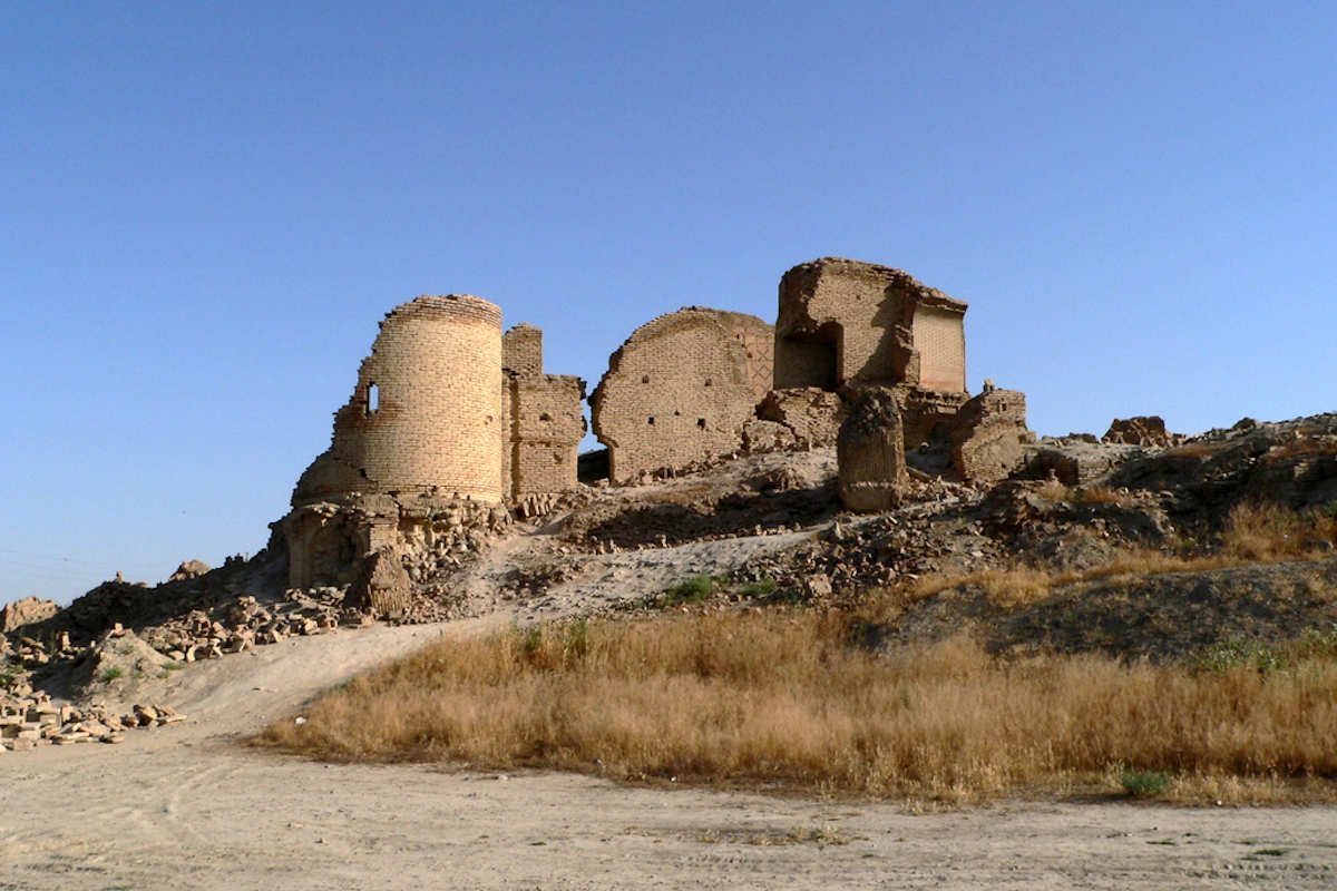 Anau settlement attraction near Ashgabat, Turkmenistan: Historic ancient ruins under a clear blue sky.