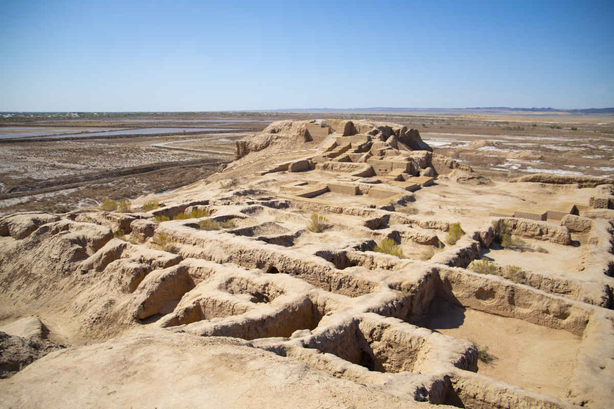 Ancient Khorezm fortress ruins in the Uzbek desert, a highlight of any Central Asia travel tour.