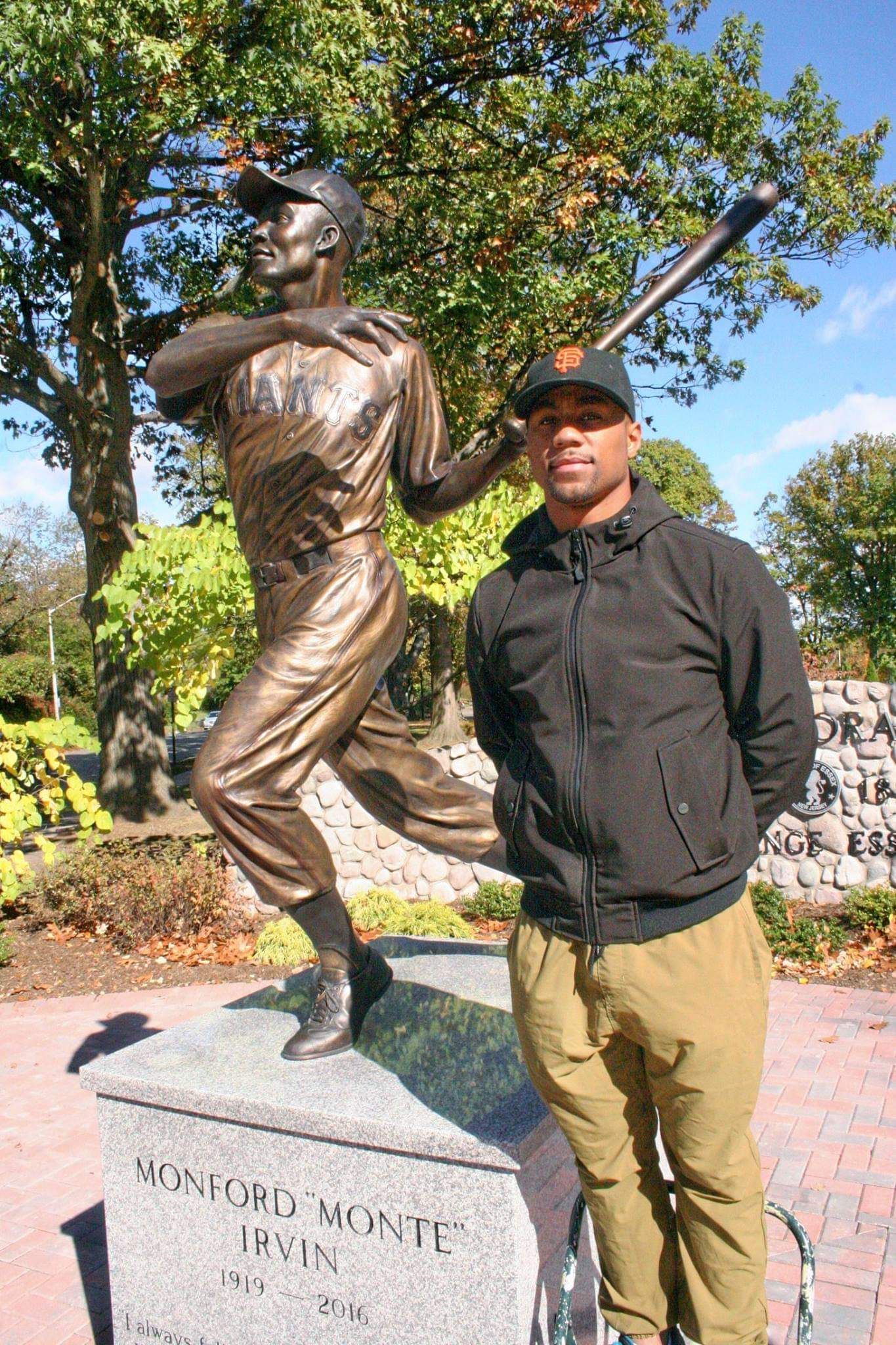 Me with statue of Cousin Monte Irvin At Monte Irvin Park in Orange, NJ. Former Newark Eagle and San Francisco/New York Giant. Irvin followed right behind Jackie Robinson to cross the color barrier line in Major League Baseball. Negro league and MLB Hall of Fame inductee.