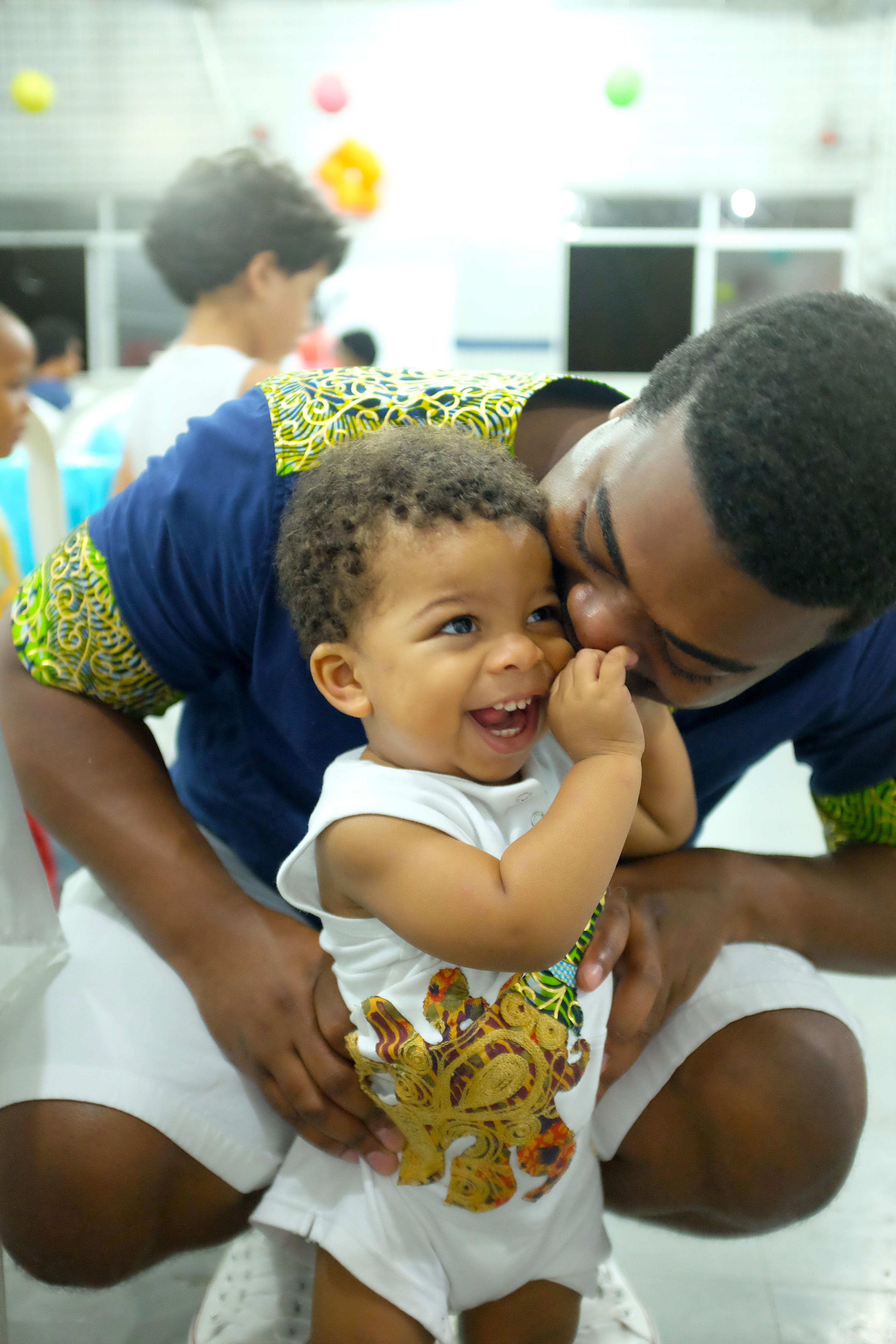 At his first birthday party in Salvador, Bahia, Brazil (2015). I whisper in his ear all the time. This night I told him "Pai (father) will love you forever."