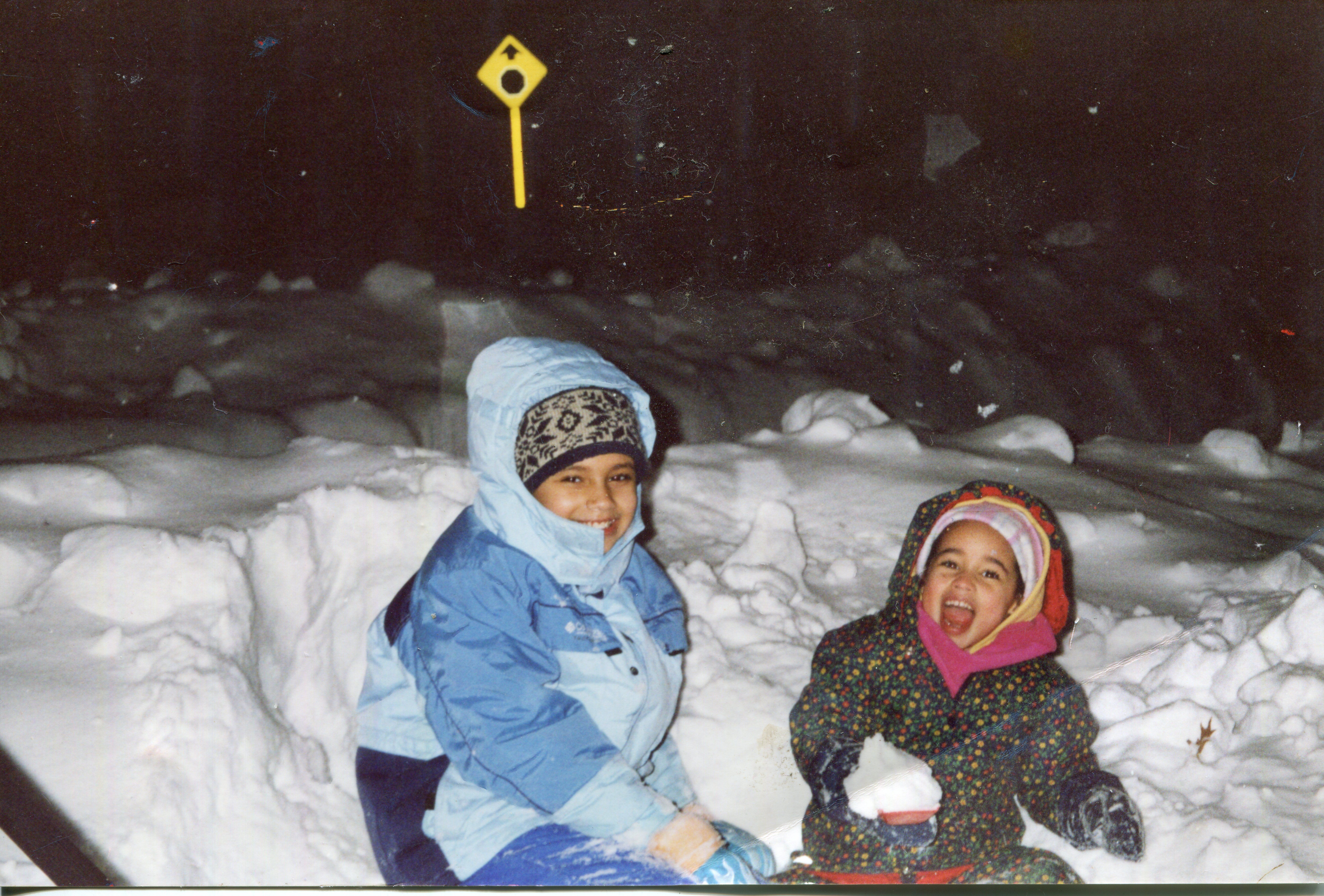  Aly and I playing in the snow in Maplewood. My mom used to take us outside at night whenever there were big snows. Early 2000s