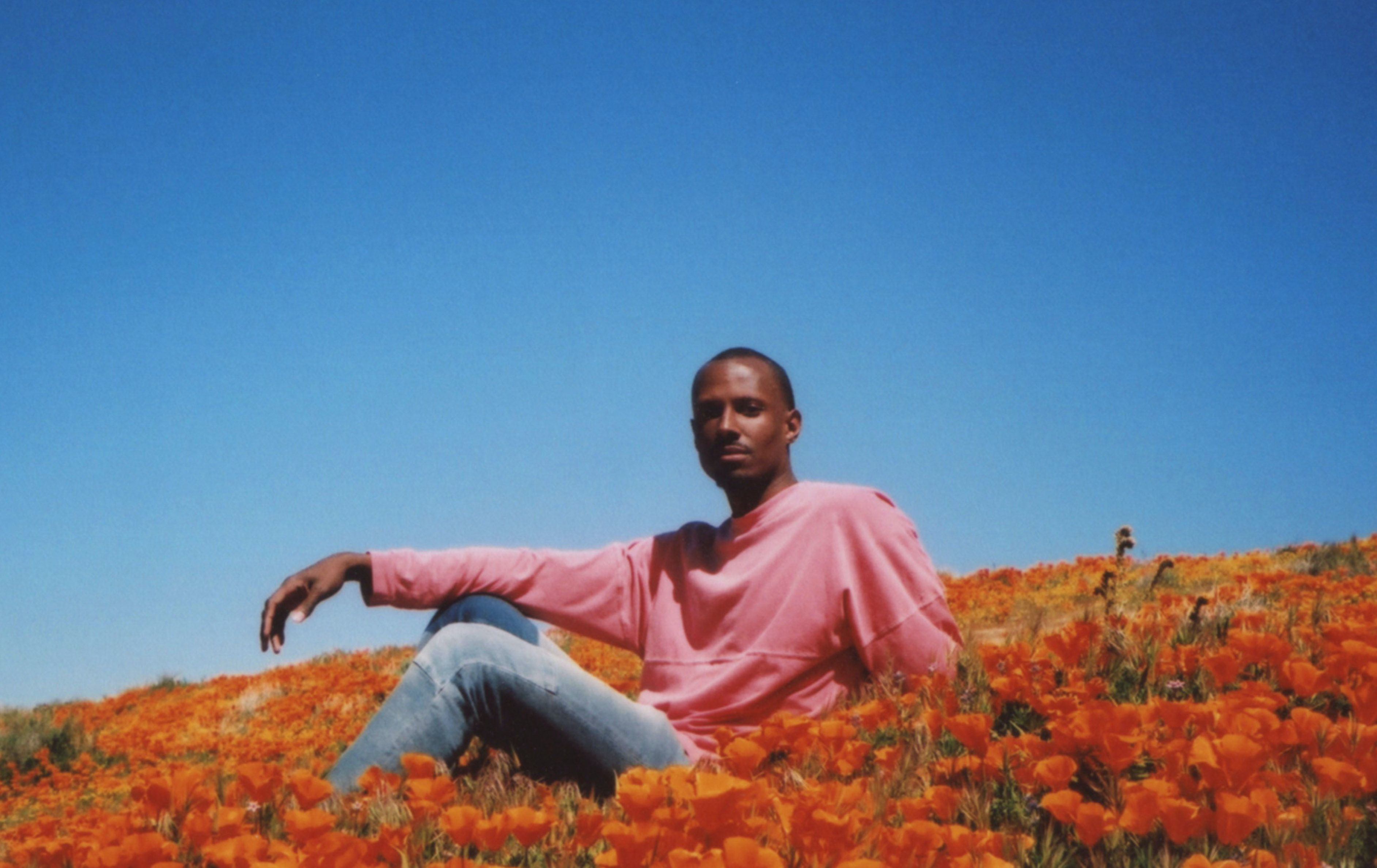 2019. This is my friend Anthony in a field of California poppies during an early spring bloom. 