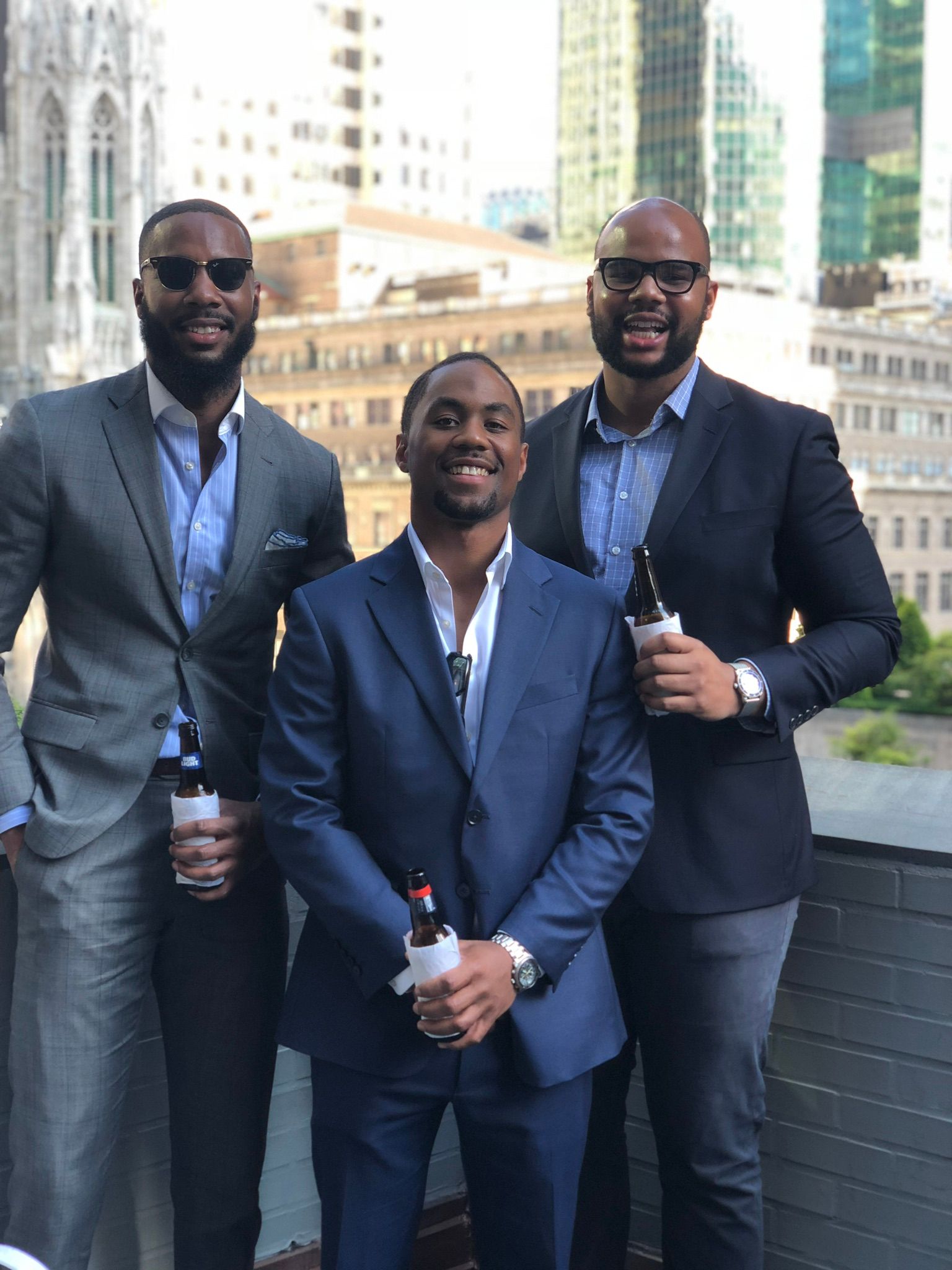 Brothas in suits because why not? Midtown Manhattan, NYC. Commercial real estate account managers.