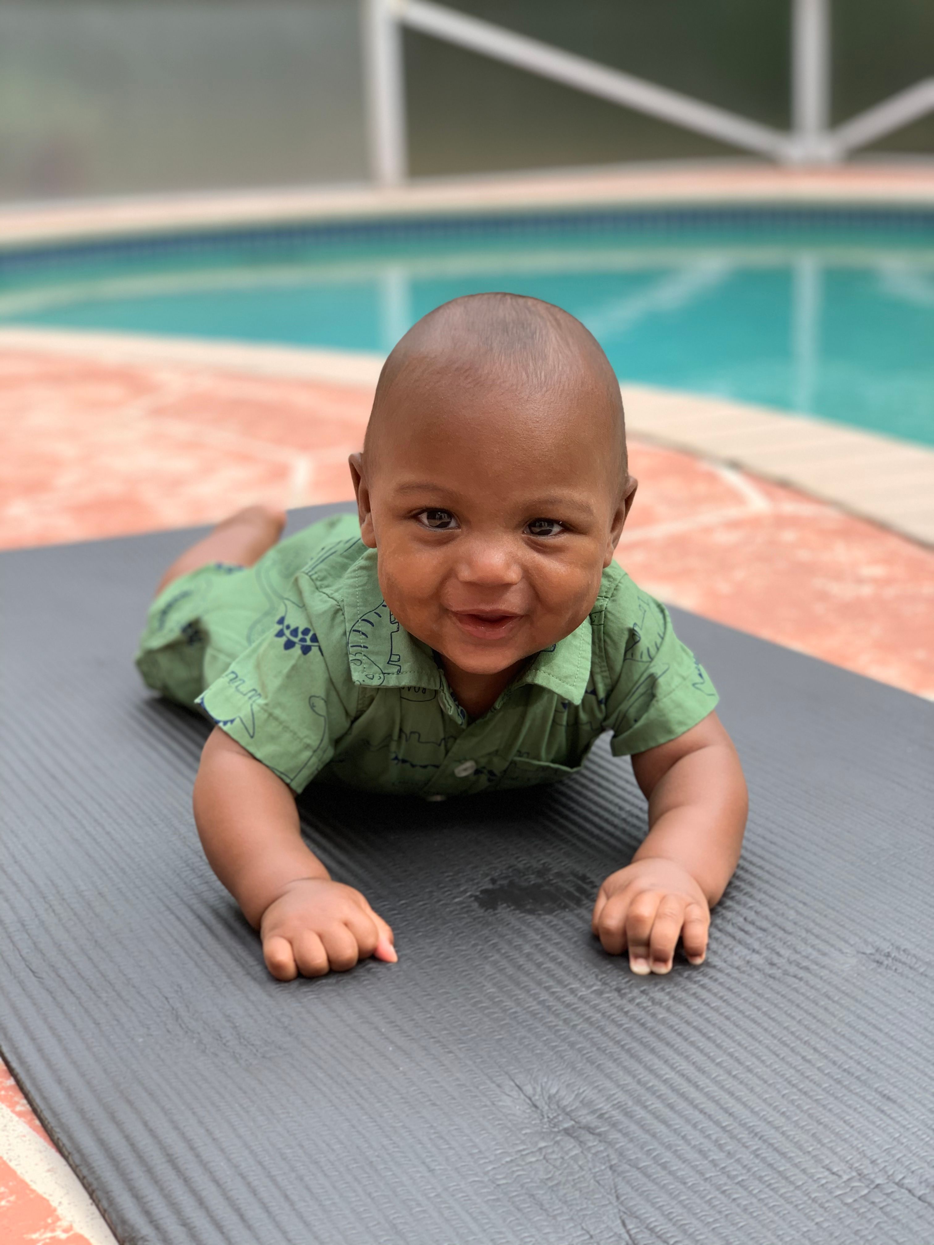 This is my baby brother junior by the pool.