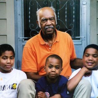 (1/2) Contrasting pictures of grandfather and his 3 grandsons. Young boys to grown men college graduates. Worked 2 jobs to support his family in East Orange to get this. Good stock