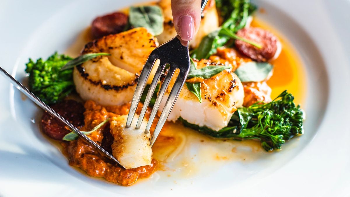 Moments before an culinary tourism influencer enjoys the first bite of an entree.