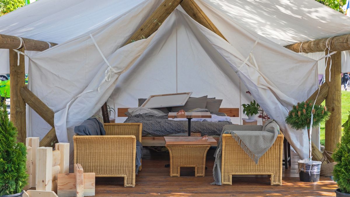 A fully decorated and furnished glamping tent