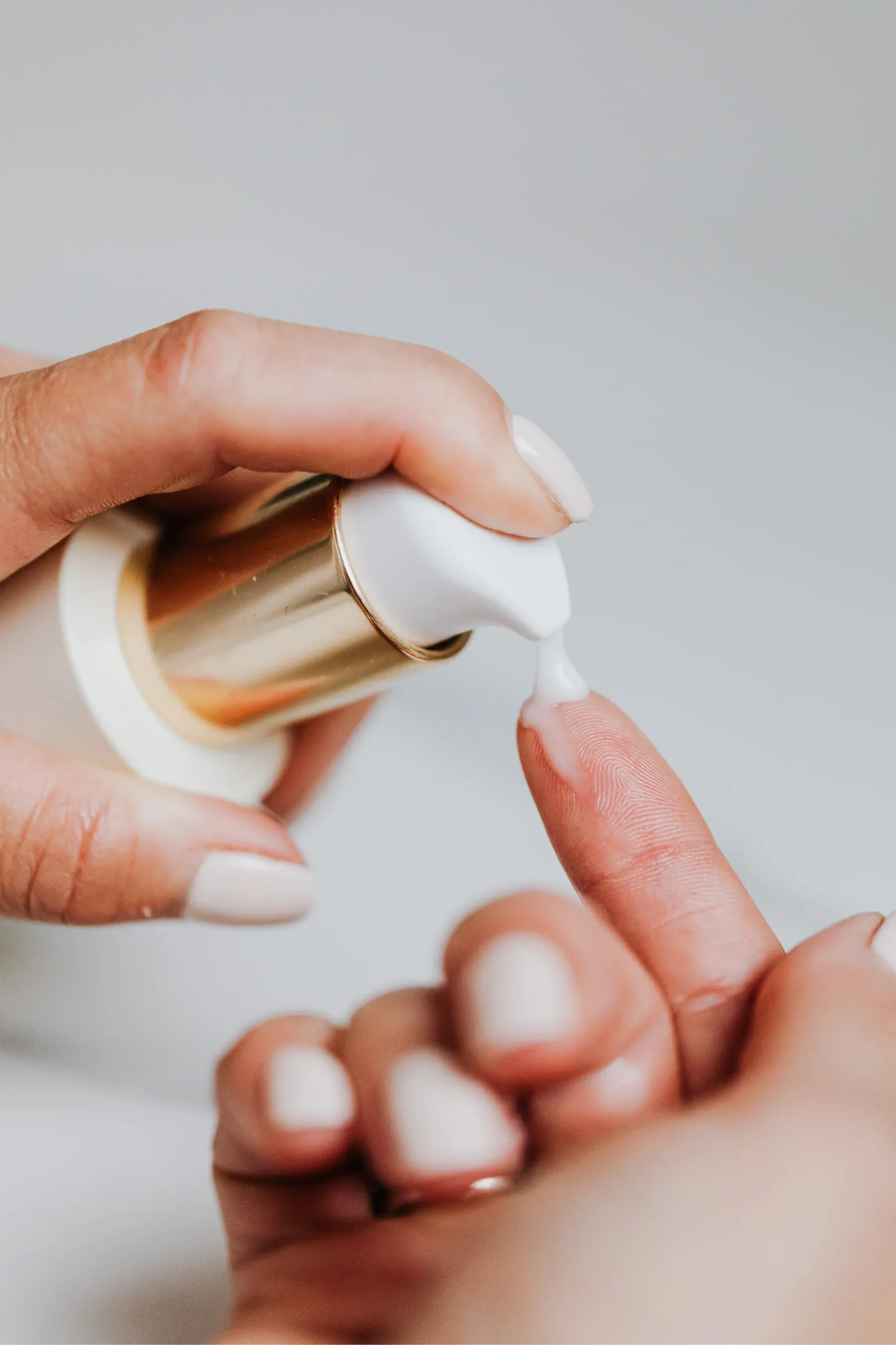 Eye Cream being pumped onto finger