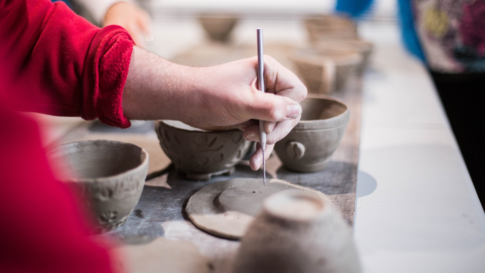 People at a pottery workshop