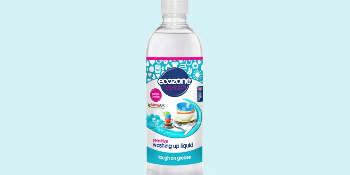 A bottle of ecozone washing up liquid on a light blue background