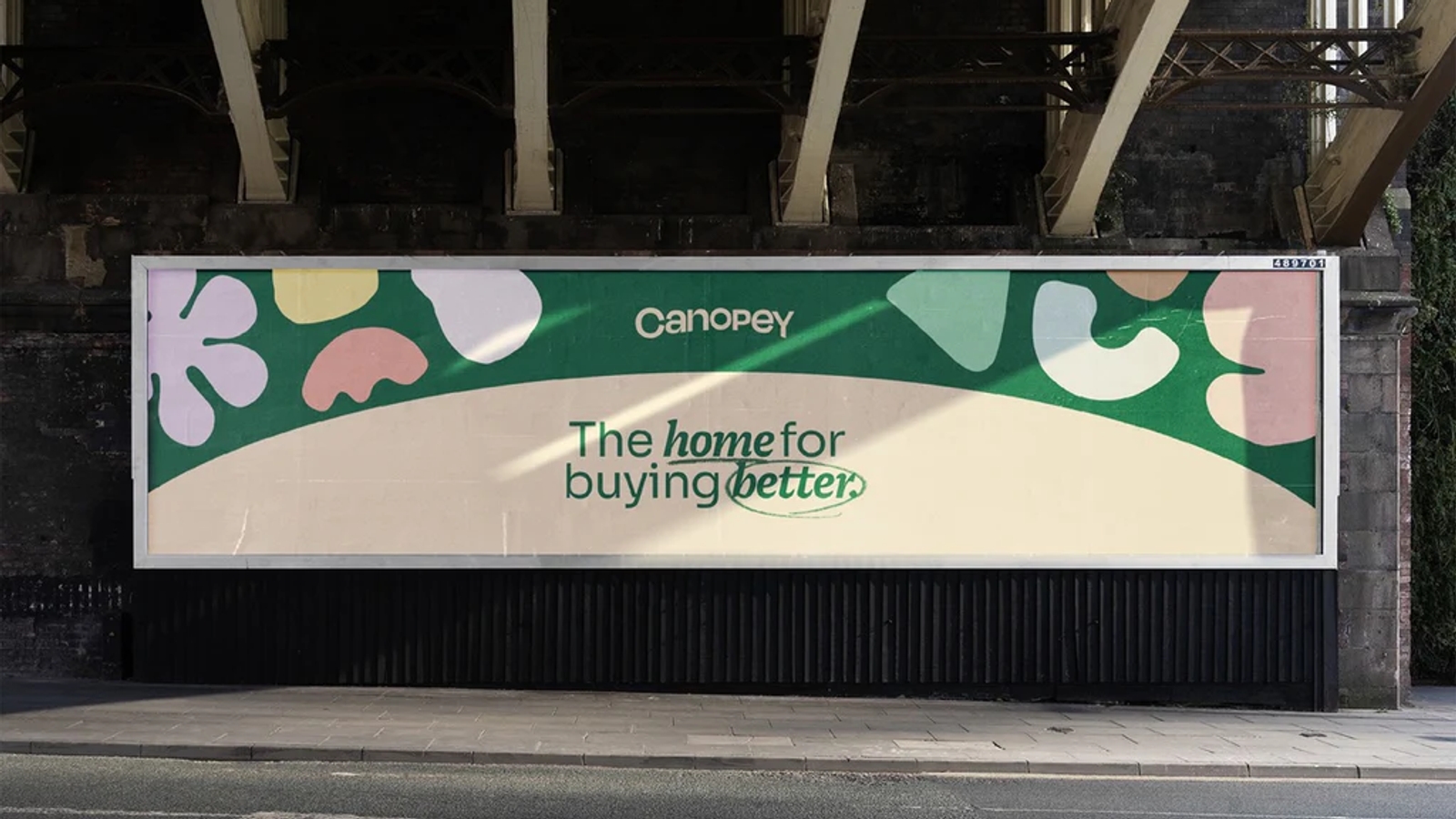 A billboard with the Canopey logo and the words 'The home for buying better'