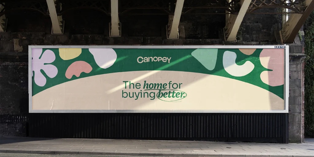 A billboard with the Canopey logo and the words 'The home for buying better'