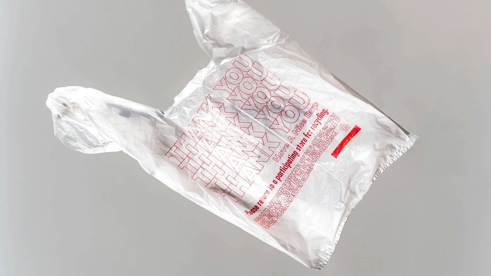 White plastic bag with 'Thank you' text