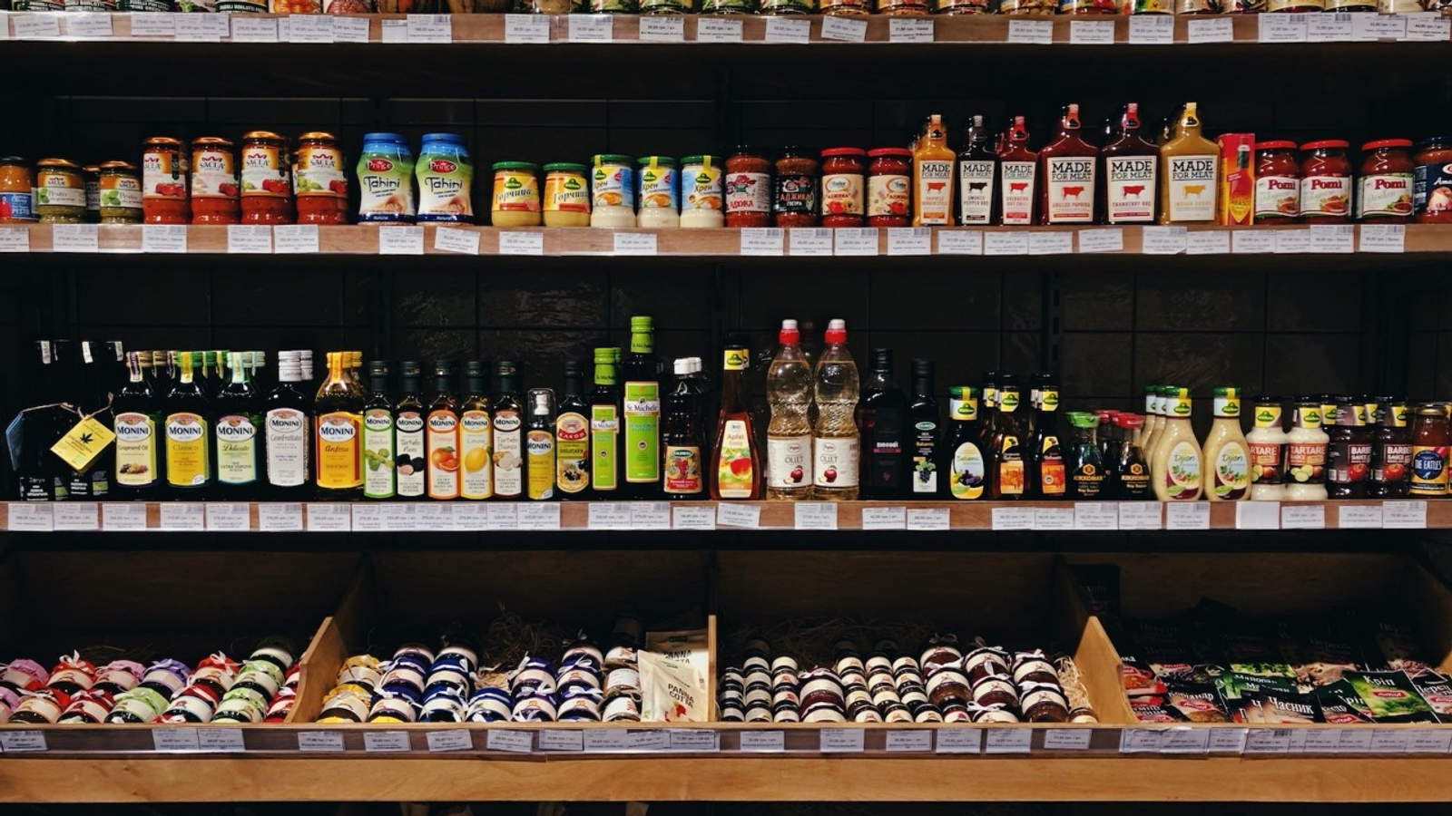 Cans and jars of food on shelves