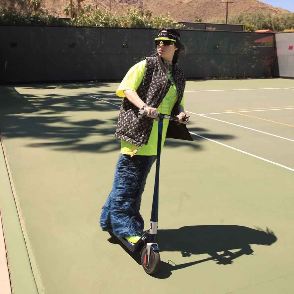 billie eilish riding unagi electric scooter