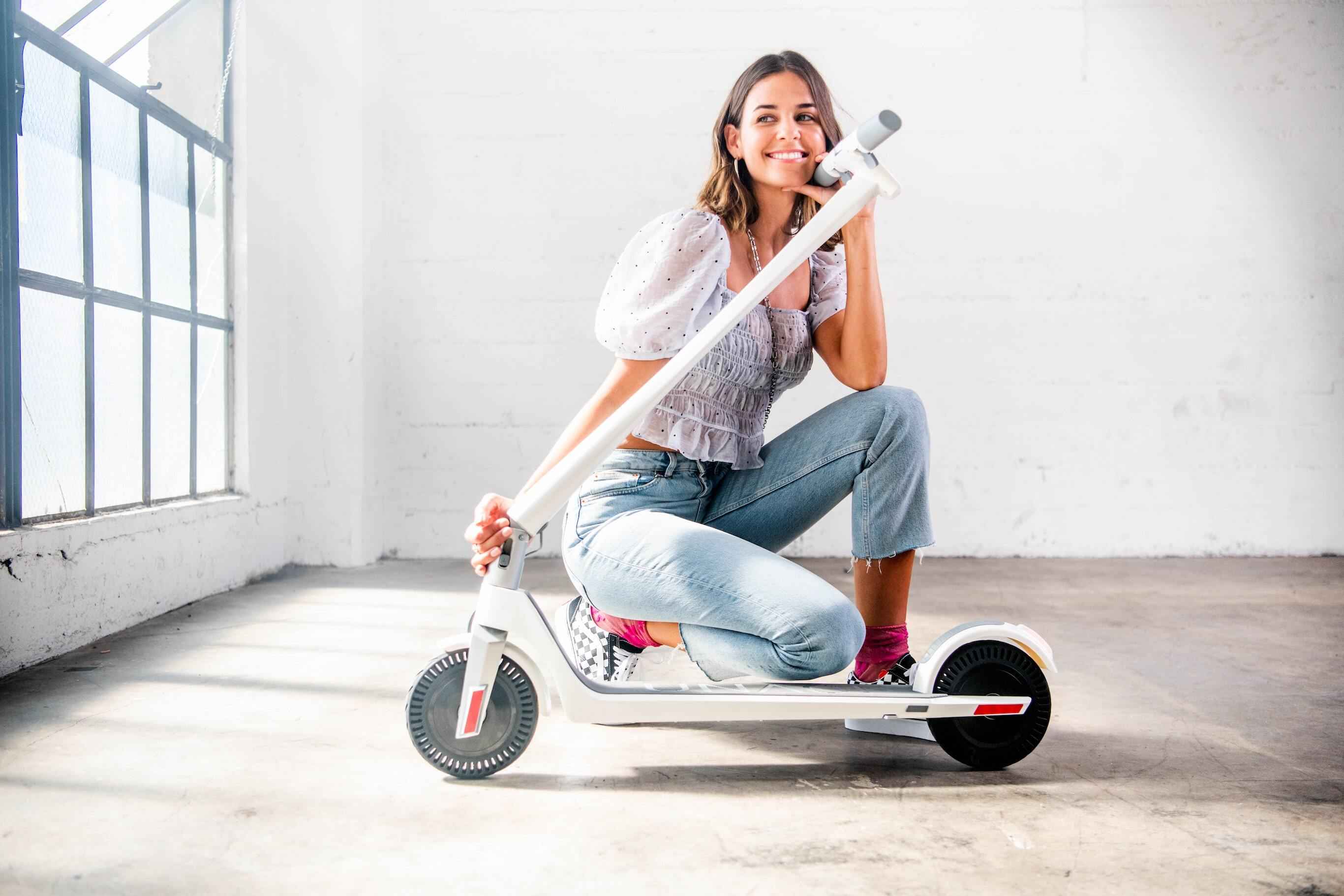 Woman Folding White Adult Portable Electric Scooter