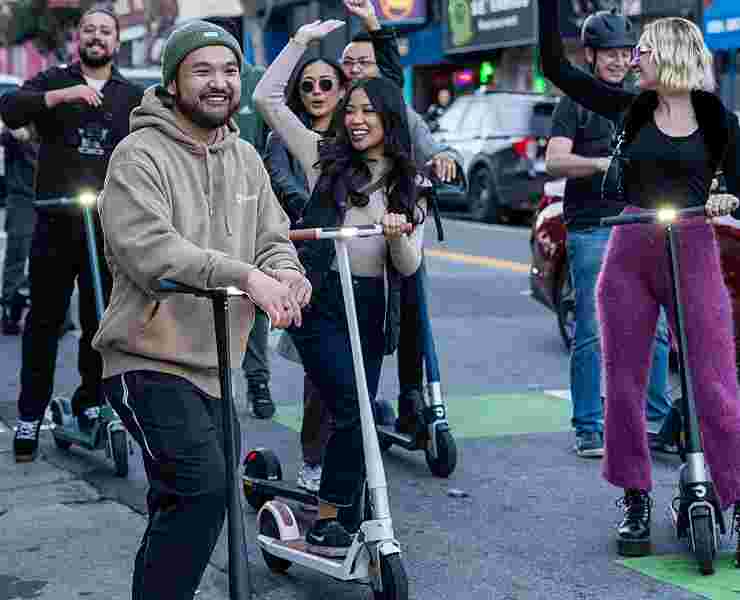 UNAGI scooter riders