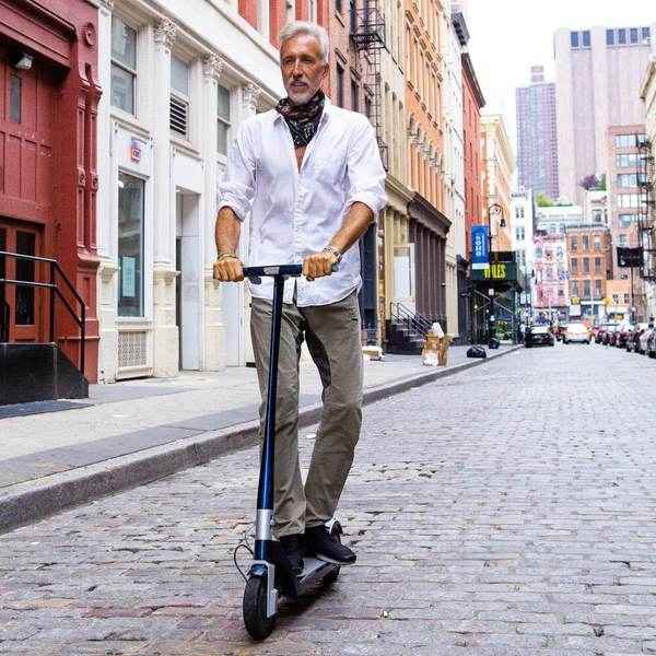 elderly white male scooter rider