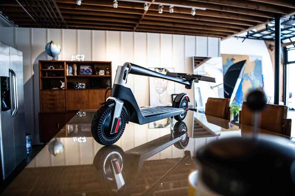 folded unagi electric scooter interior