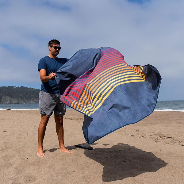 Rumpl Stash Mat - Deepwater Rays on the beach