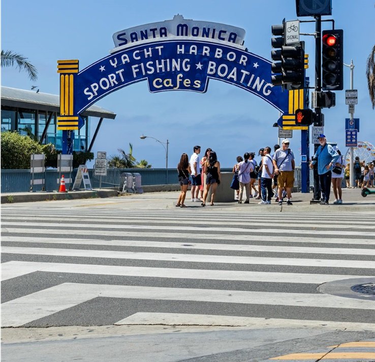 Riding an e scooter in Santa Monica