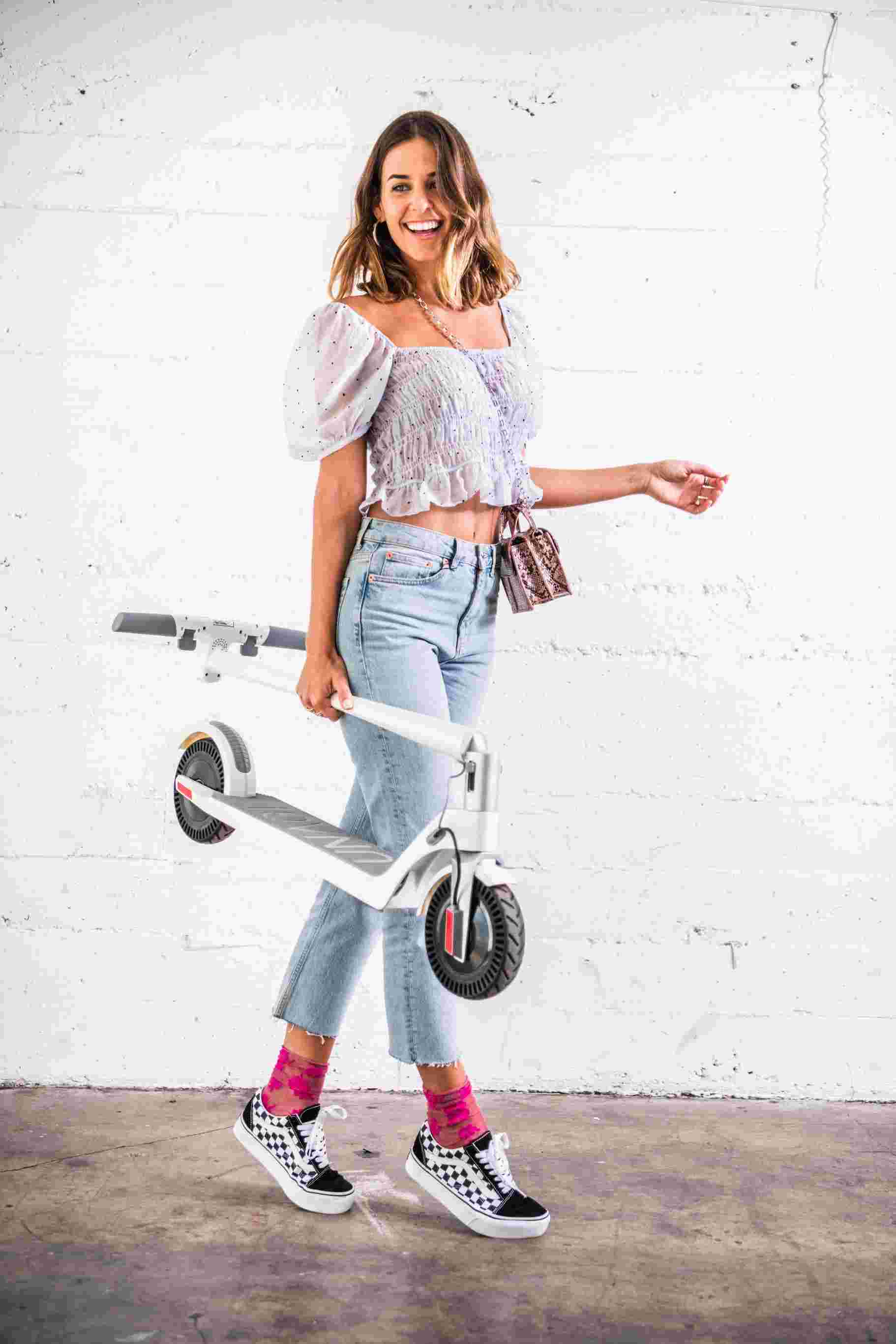 Electric Scooter Lifestyle Woman Carrying White Scooter
