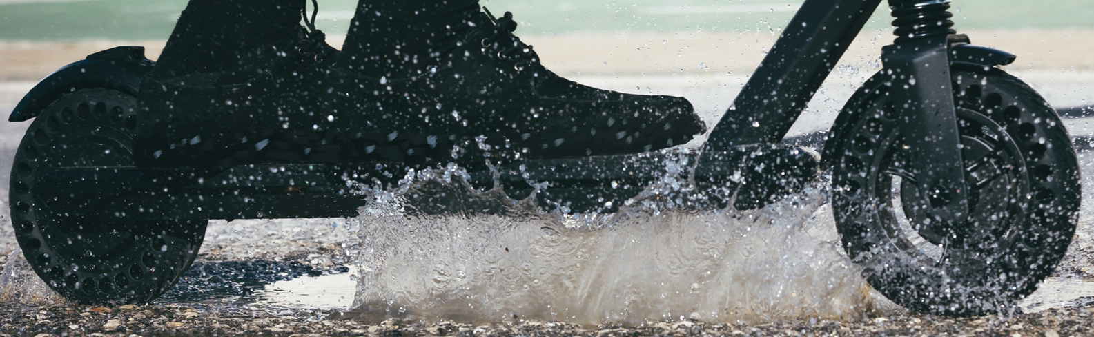 Electric scooter and water splashes