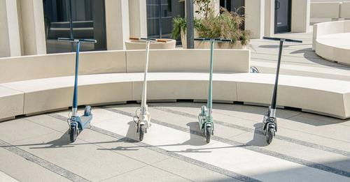 four unagi electric scooters