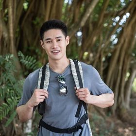 Asian man in the woods 