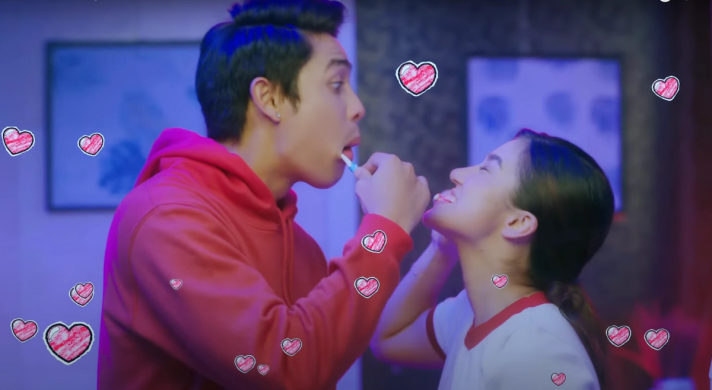 Young couple brushing their teeth together