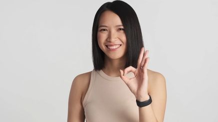 Happy Asian woman with short bob