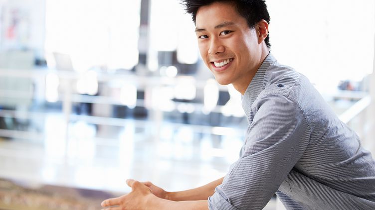 Portrait of smiling Asian Man