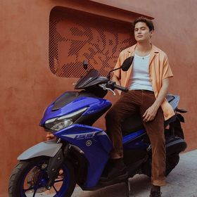 Filipino actor James Reid on a motorcycle
