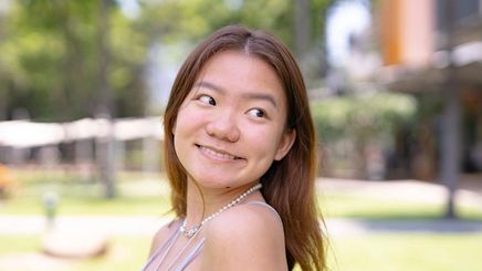 Young Asian girl smiling