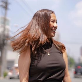 Asian woman with lots of hair movement 