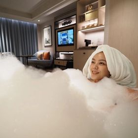 Asian woman in a bathtub