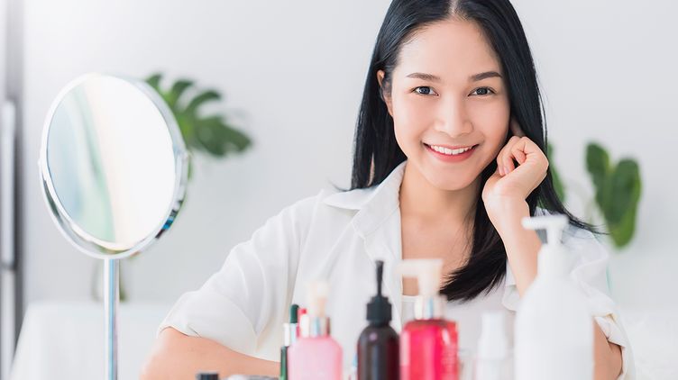 Asian woman showing her skincare counter