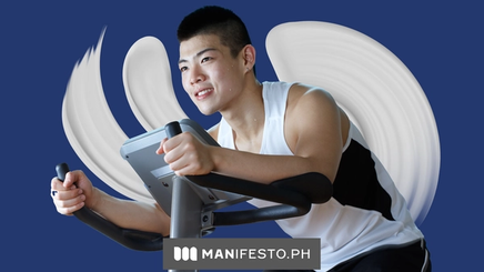 A man working out on an exercise bike