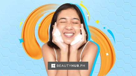 Filipina washing her face with foam cleanser