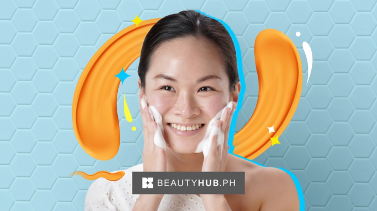 Young Asian woman washing with facial foam