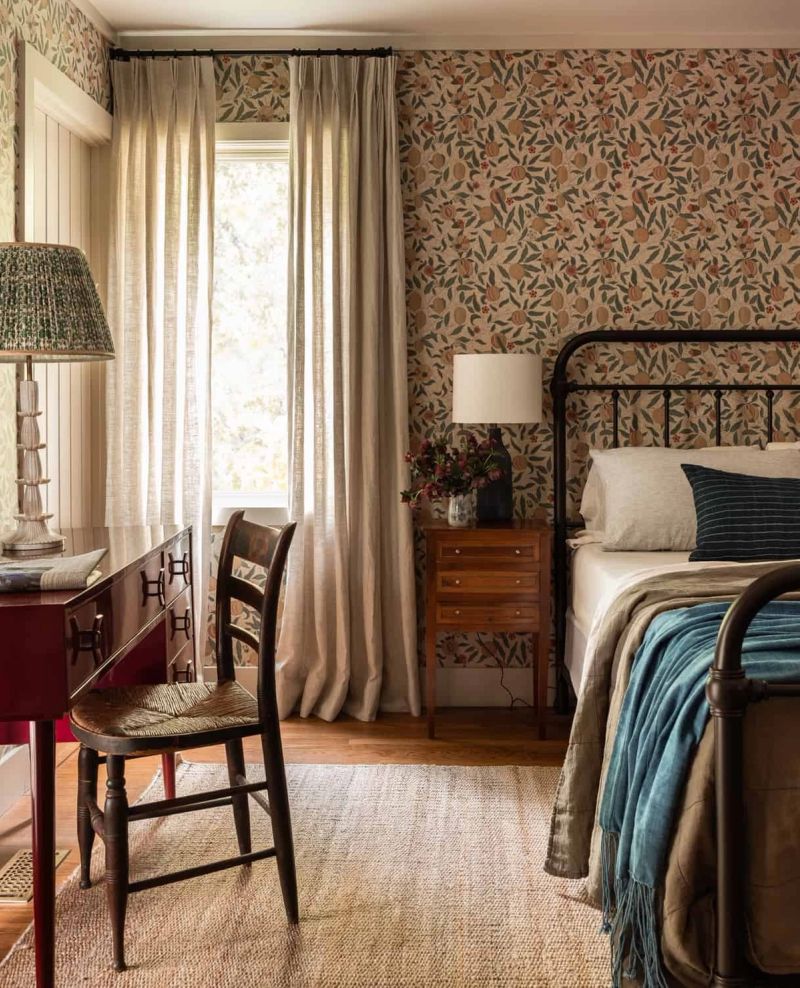 Bedroom with wallpaper and soft drapery