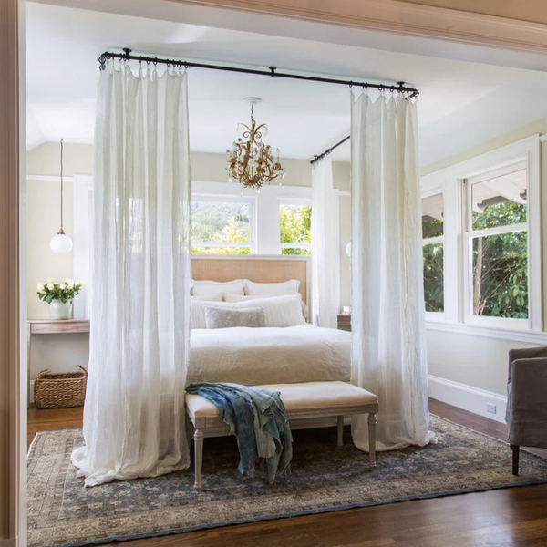 Canopy bed with sheer curtains