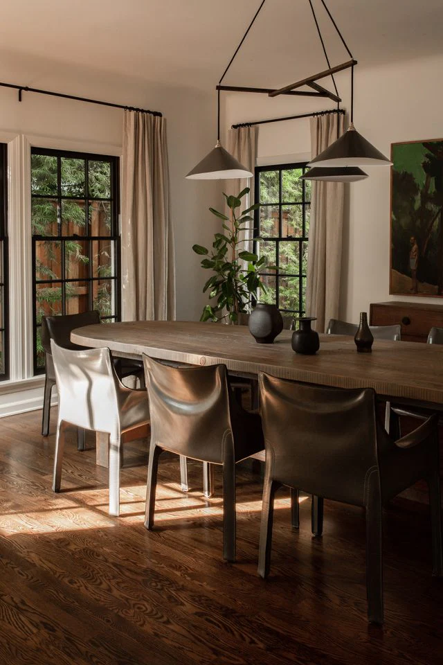 Dining room with hand-forged wrought iron drapery rod