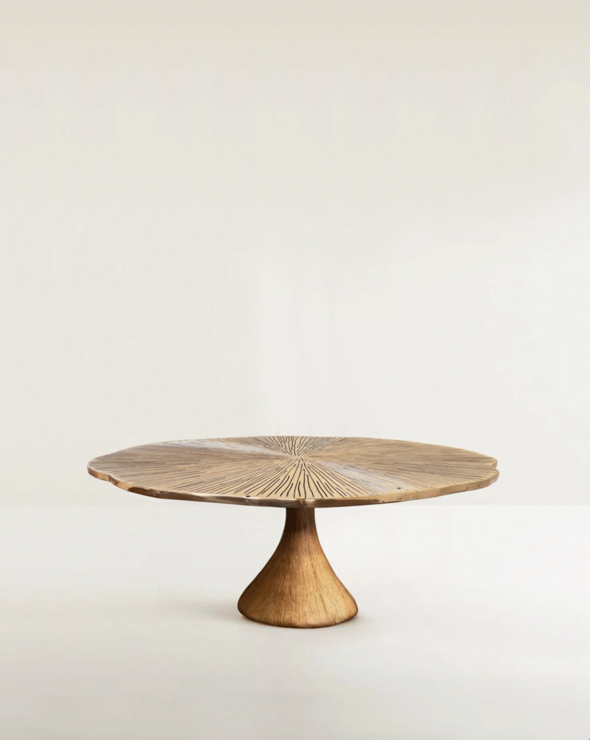 FUN GUY coffee table bronze curves and lines.