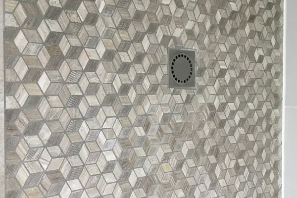 Pose de mosaïque pour douche italienne à Aubigné-Racan Pose de mosaïque pour douche italienne à Aubigné-Racan - 1 sur 2