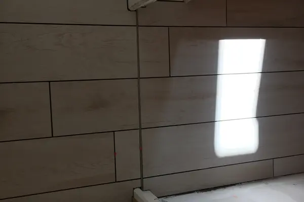 Pose de carrelage au sol dans un couloir à Montval-sur-Loir Pose de carrelage au sol dans un couloir à Montval-sur-Loir - 8 sur 20