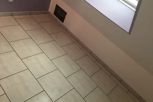 Pose de carrelage au sol et plinthes à Parigné-l'Évêque Pose de carrelage au sol et plinthes à Parigné-l'Évêque - 3 sur 6