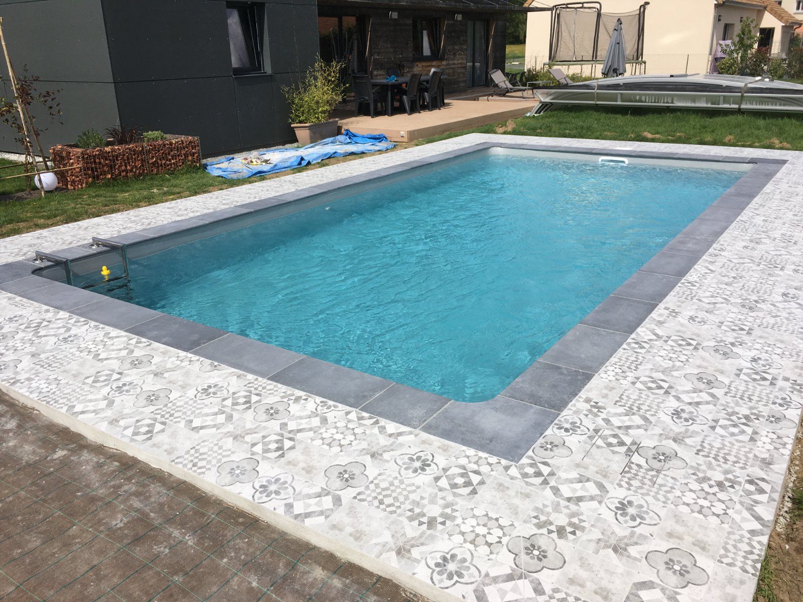Pose de carrelage autour d'une piscine à Moncé-en-Belin (72) — Piscine à Moncé-en-Belin — photo 4 sur 4